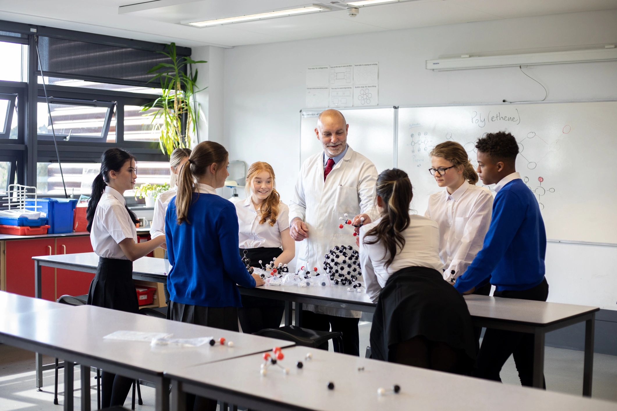 Students and teacher in a school science lab
