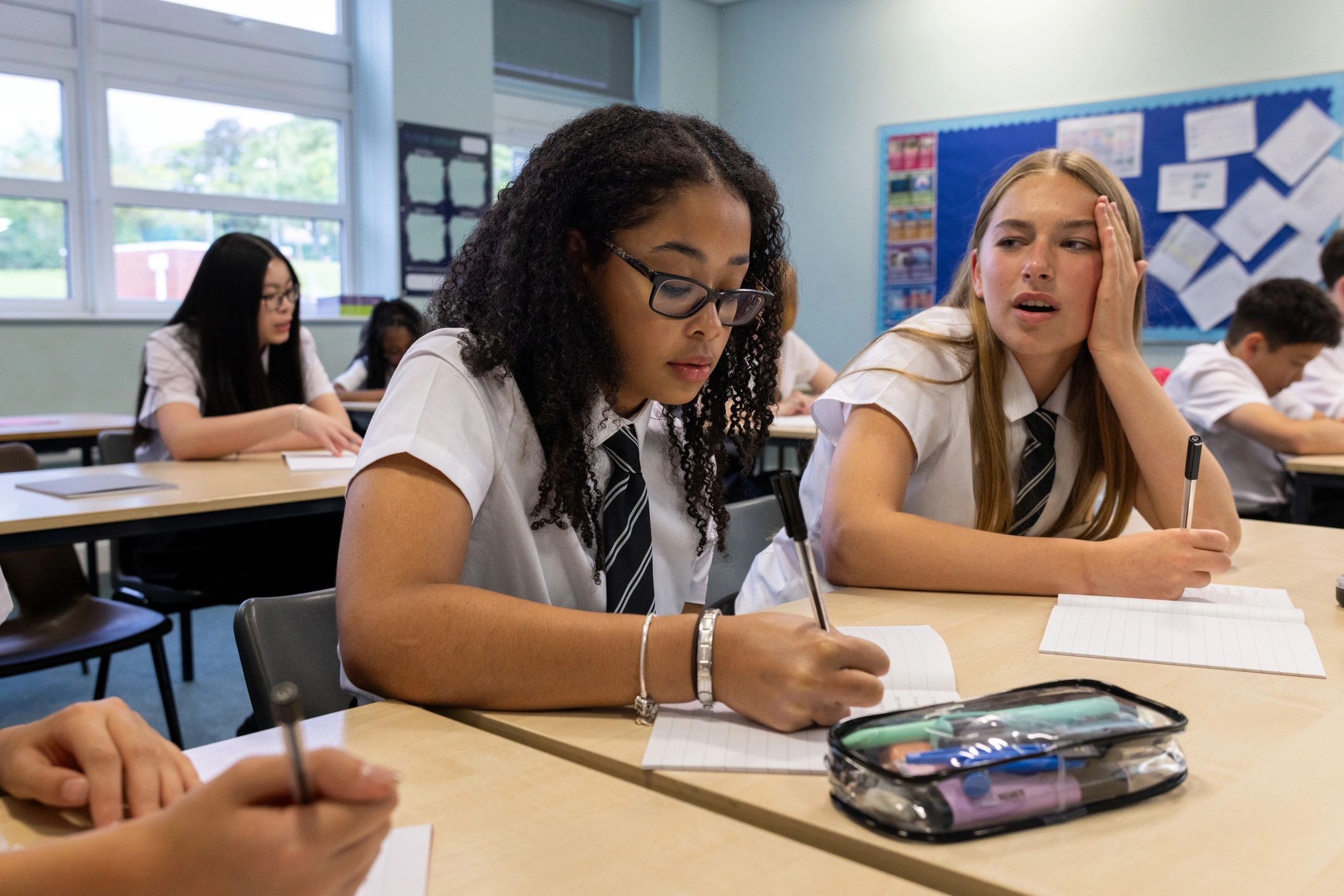 Students studying together in a modern classroom